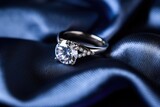 a diamond engagement ring on a cushion of velvet