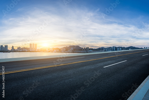 Highway and skyline nature landscape at sunset by the sea