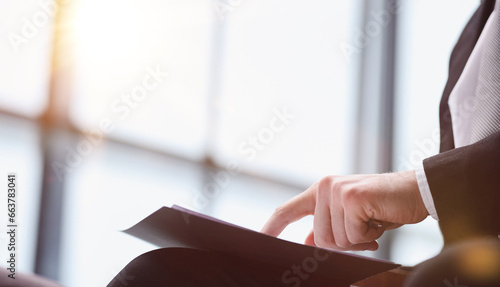 Close up of businessman or lawyers discussing about contract or business agreement at law firm office