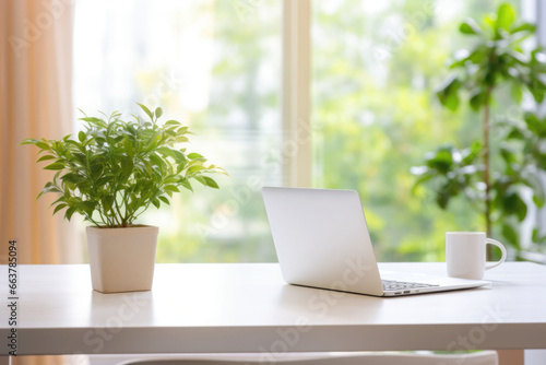 Minimalist simple office workspace with a laptop and a potted plant in soft natural light. Generative AI