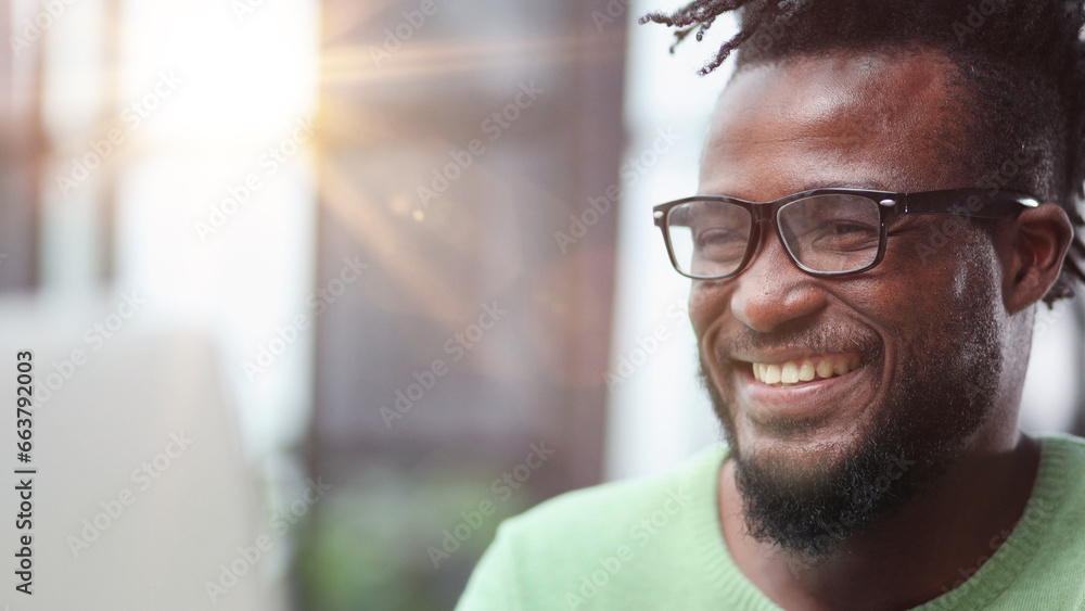 Fototapeta premium Close up front portrait smiling young black man