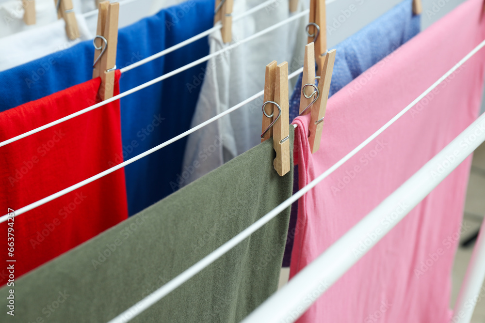 Naklejka premium Clothes are dried on the dryer after washing