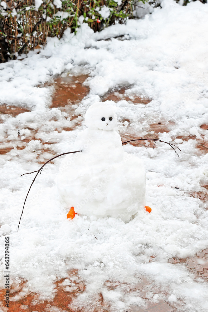 snowman at a greek forest - snowy day - winter park snowman at a greek forest - snowy day - winter park