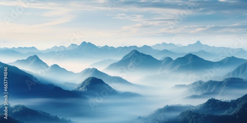 A mountain range is seen in the distance with fog.