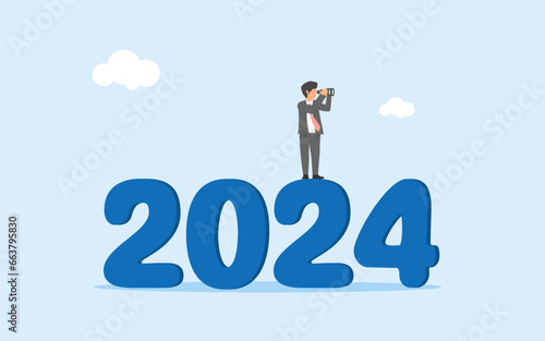 Business vision for 2024. Year review. Preparation to face new challenges in the new year.Forecast and future opportunities. businessman standing at the number 2024 while looking through binoculars