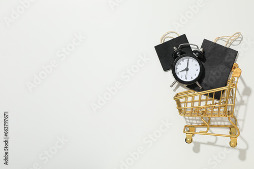 Shopping cart with items on black friday.