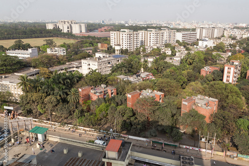 Cityscape of metropolitan Dhaka, Bangladesh, with the National Parliament in the background photo