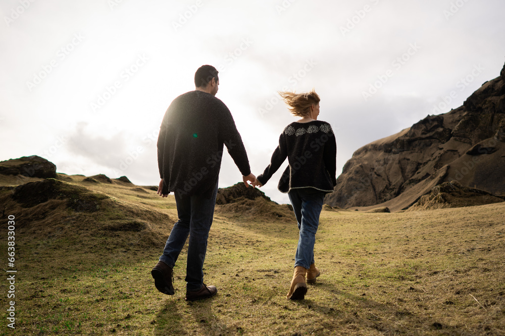 Couple in love against the background of mountains Couple in love against the background of mountains