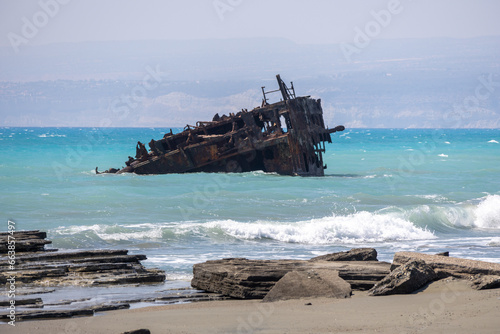 Akrotiri Shipwreck on turquoise rocky shore on Mediterranean Coast Aglantzia, Cyprus.