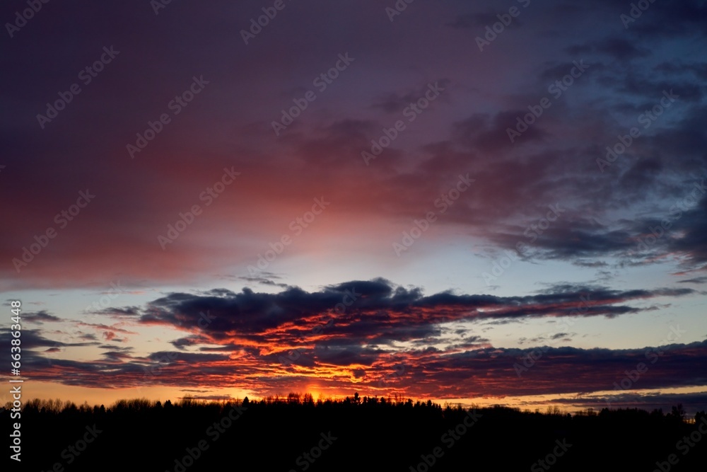 Obraz premium Cloudy sunset in spring, Vaasa, Finland.