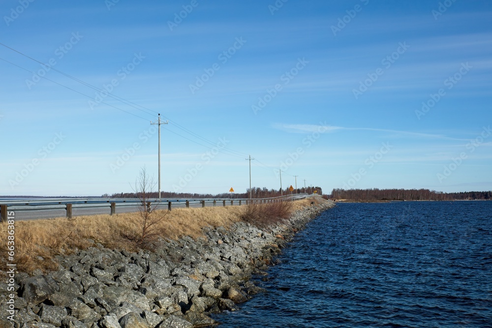 Coastal road on the island of Raippaluoto in spring, Vaasa, Finland. Coastal road on the island of Raippaluoto in spring, Vaasa, Finland.