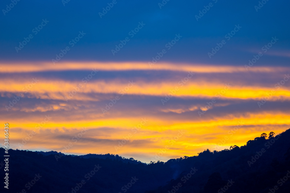 Landscape colorful clouds in the sky sunset or sunrise over sea with reflection in the tropical sea,Beautiful landscape scenery,Amazing light of nature, Landscape nature background