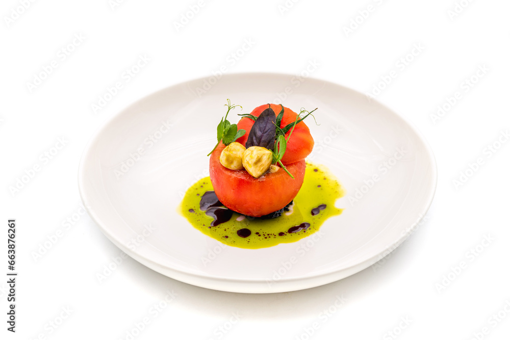 Tomato Caprese salad with mozzarella and micro sprouts on white background Tomato Caprese salad with mozzarella and micro sprouts on white background