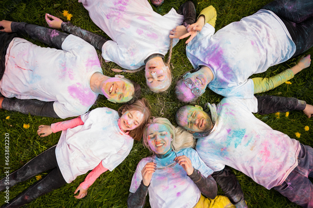 Fototapeta premium Group of happy people celebrating Holi 