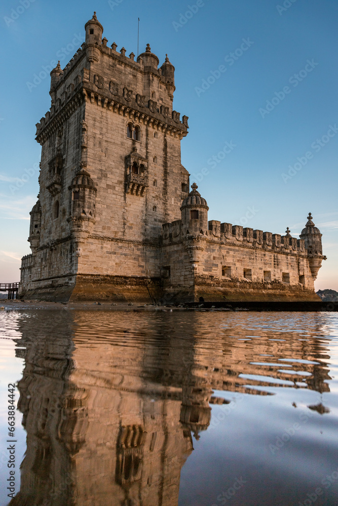 belem tower in autumn at sunset