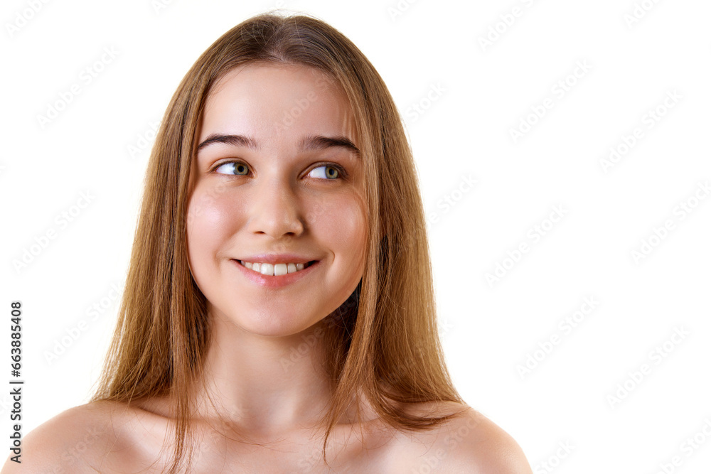 Close up photo of young smiling with teeth young woman looking away. Natural beauty. Increase in lips, cosmetology.