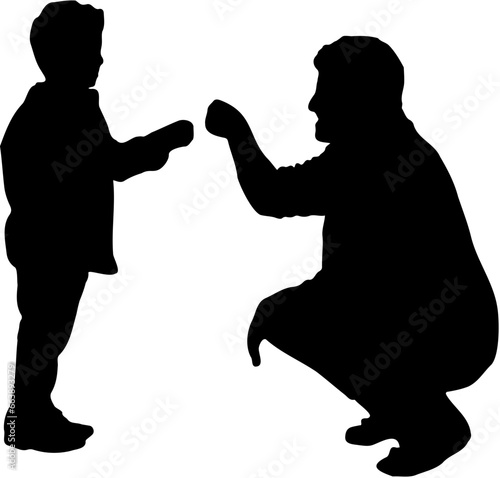Silhouette of father and son