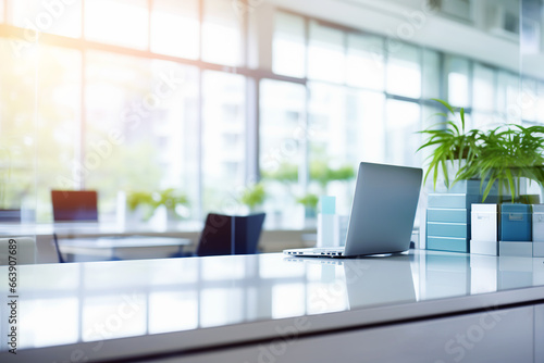 Blurred large modern office workspace in the morning
