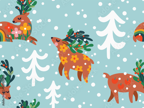 Seamless Christmas pattern with deers in the forest on light blue background