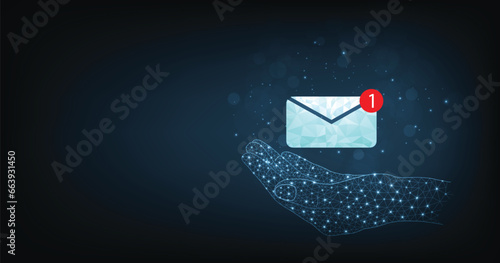 Email Notification alert concept. Technology hand holding email notification icons on dark blue background.
