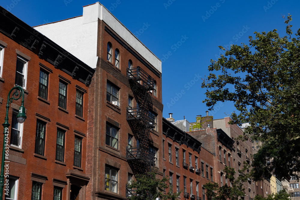 Row of Colorful Old Brick Apartment Buildings in Hell's Kitchen of New York City