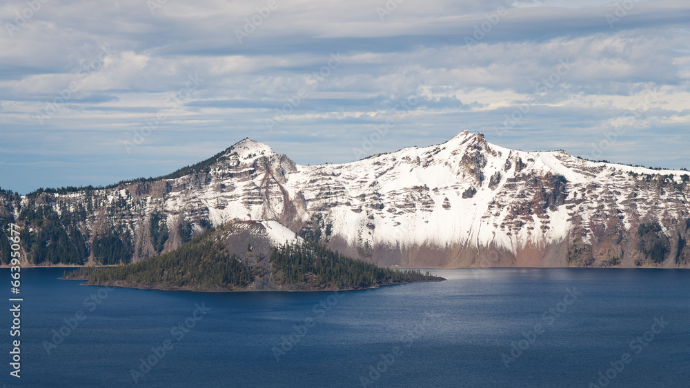 First snowfall of the season dusts Wizard Island and West Rim at Crater Lake