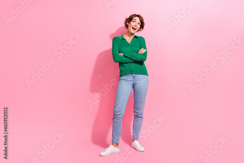 Full length photo of young girl folded arms look positive empty space she receive job offer big company isolated on pink color background © deagreez