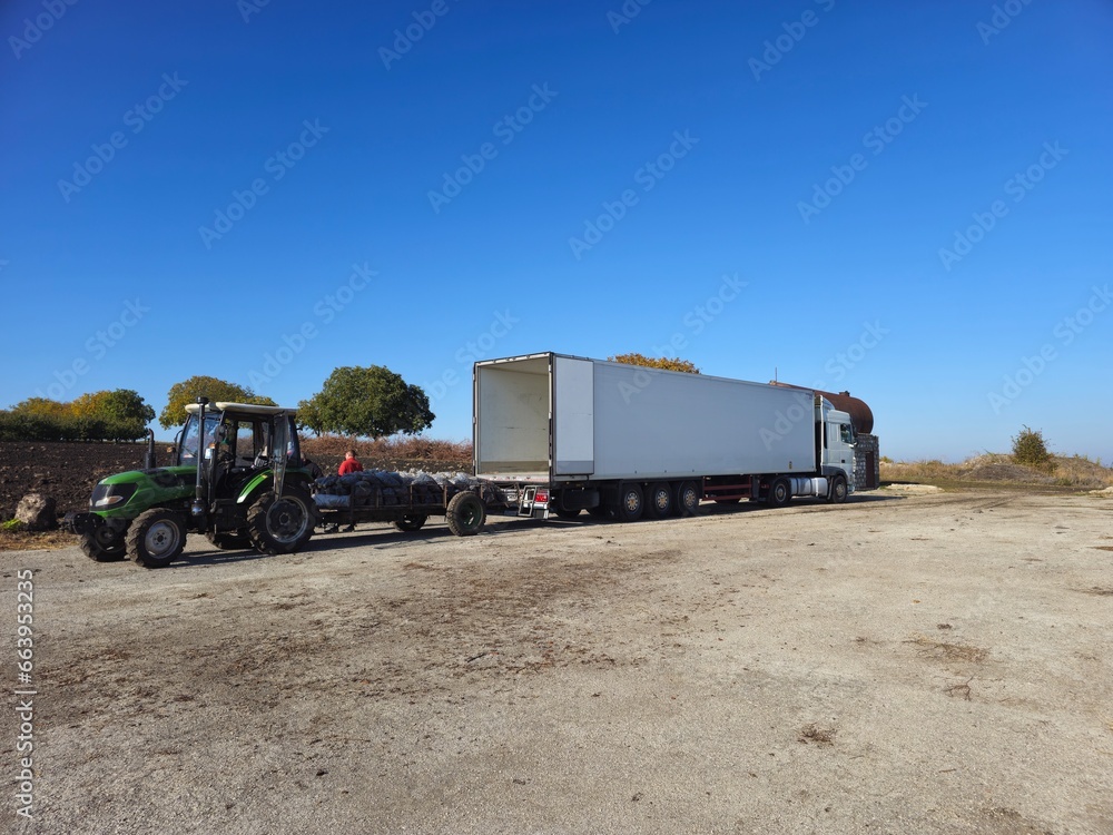 A tractor pulling a trailer