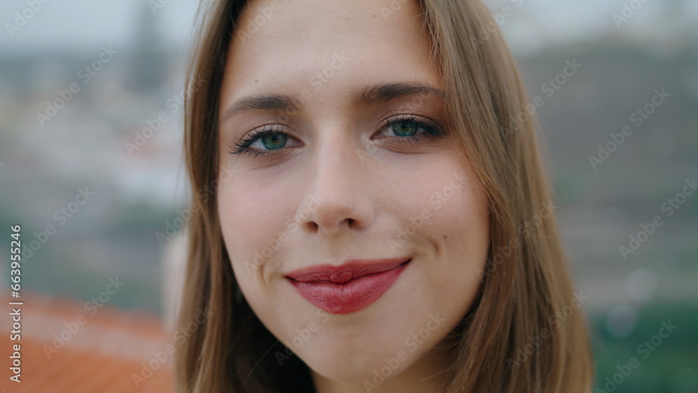 Portrait girl posing european old town alone. Smiling tourist enjoying adventure Portrait girl posing european old town alone. Smiling tourist enjoying adventure