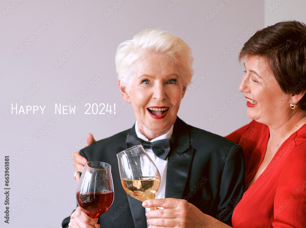 Two beautiful stylish mature senior women celebrating new year. Fun, party, style, celebration concept Two beautiful stylish mature senior women celebrating new year. Fun, party, style, celebration concept
