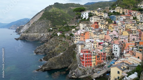 Fototapeta Naklejka Na Ścianę i Meble -  Europe, Italy, Liguria, Cinque Terre - Drone aerial view of Riomaggiore - The Cinque Terre are an increasingly popular tourist attraction for tourists from all over the world Unesco Heritage 