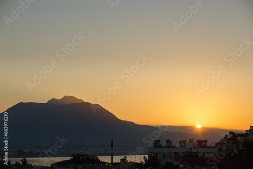 View from the mountains on Alanya, Turkey. Cityscape with sunrise over the mountains.