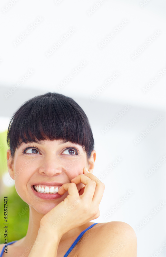 Happy, smile and young woman at her home with positive, good and confident attitude or mindset. Happiness, excited and female person from Canada biting her nail and thinking in her modern house. Happy, smile and young woman at her home with positive, good and confident attitude or mindset. Happiness, excited and female person from Canada biting her nail and thinking in her modern house.