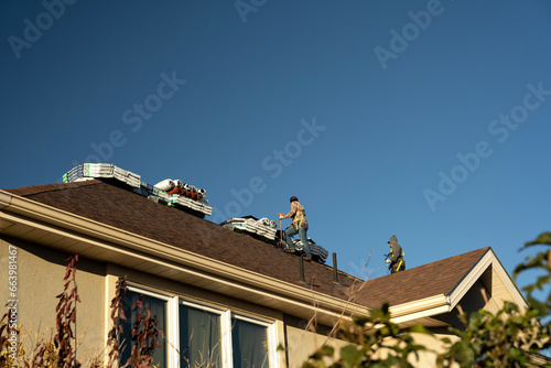 Reroofing house after hail storm; Laramie, Wyoming