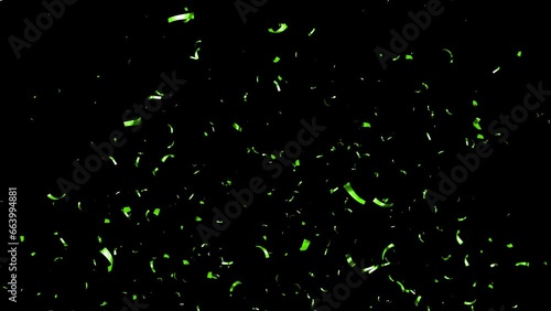 Green Confetti Falling on a a Black, Green, Blue and White Background. photo