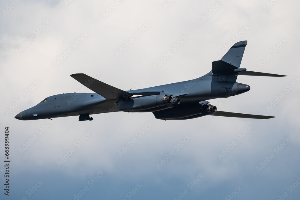 Strategic bomber plane at air base. Air force and army. Airport and airfield. Military aircraft. Aviation industry.