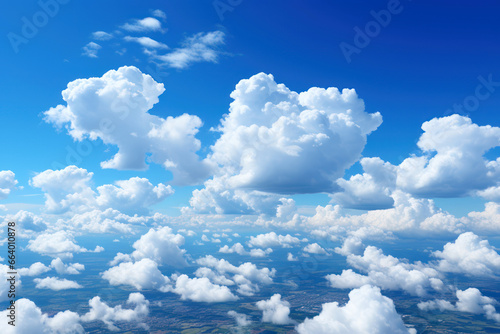 Blue sky and clouds, aerial view of planet Earth curvature, sunny day