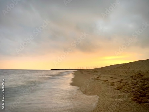 beautiful sunset on the beach of premia de mar  spain