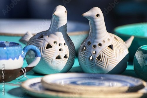 Colorful handmade dishes, plates, ceramics. Traditional greek ceramics, island Kos. Close up.