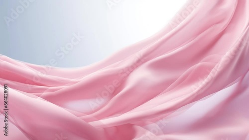 A vibrant pink fabric against a contrasting blue backdrop