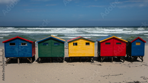 Colourful row of beach huts on the beach at Muizenberg, South Africa