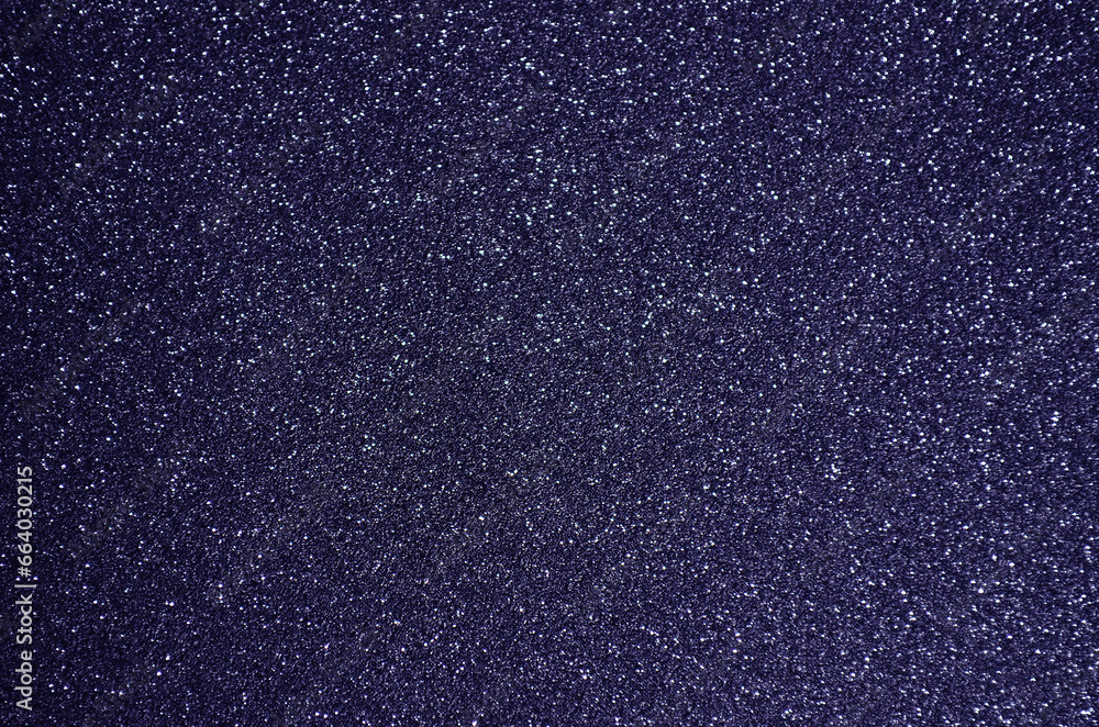 Fototapeta premium Fondo de brillos / textura glitter de color violeta/morado oscuro. Se puede usar como fondo de celebración, fiesta, año nuevo, navidad.