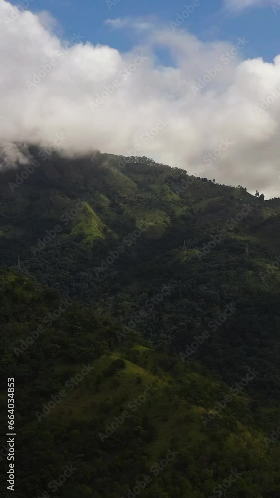 Top view of Mountain slopes covered with rainforest and jungle. Sri Lanka. Top view of Mountain slopes covered with rainforest and jungle. Sri Lanka.