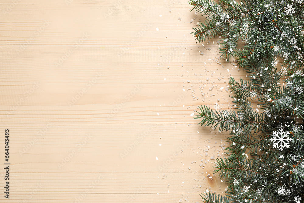 Beautiful Christmas tree branches and snow on wooden background with space for text - obrazy, fototapety, plakaty 