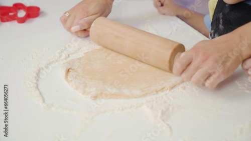 Close-up Rolling out dough on the table