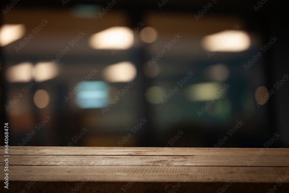 Empty dark wooden table in front of abstract blurred bokeh background of restaurant, window frames. Can be used to display or mount your products. Mock for space. Empty dark wooden table in front of abstract blurred bokeh background of restaurant, window frames. Can be used to display or mount your products. Mock for space.