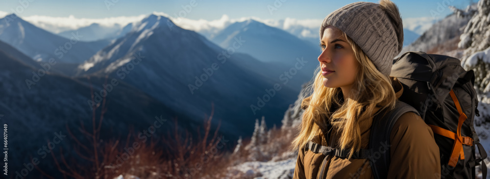 Hiker observing wildlife comfortably in revolutionary thermal winter wear 