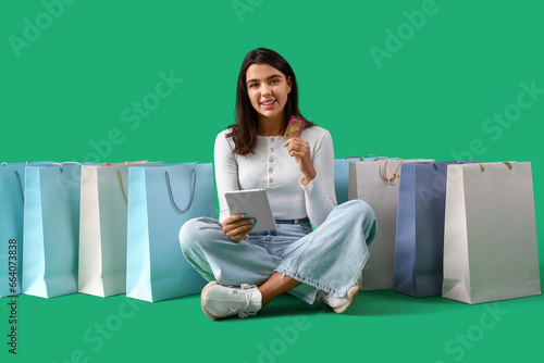 Young woman online shopping...