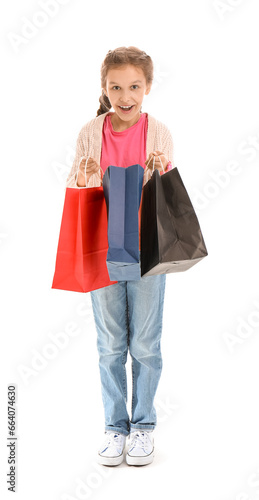 Little girl with shopping b...