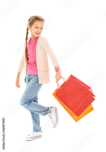Little girl with shopping b...